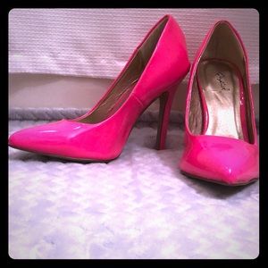 Neon pink heels